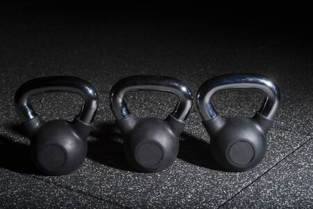 Close-up kettlebell sports equipment weight on the floorの写真素材