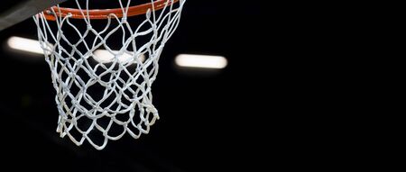 Basketball hoop isolated on black backgroundの写真素材