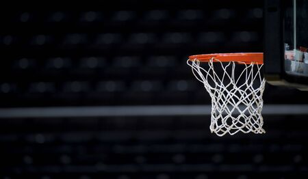 Basketball hoop isolated on black backgroundの写真素材