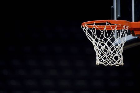 Basketball hoop isolated on black backgroundの写真素材