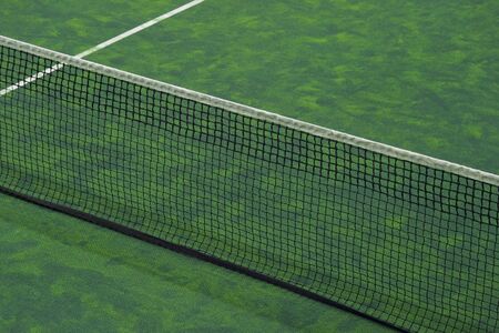 Tennis court indoor with green carpet surfaceの写真素材