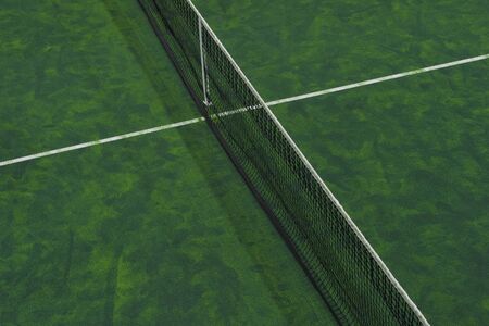 Tennis court indoor with green carpet surfaceの写真素材