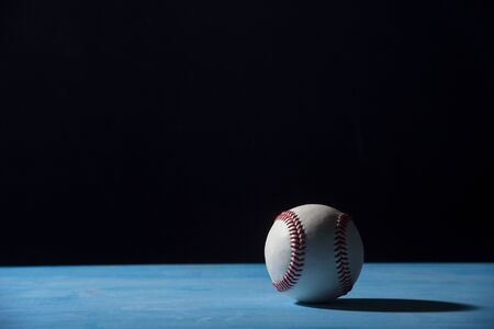 Baseball Ball On  Blue Wooden Tableの写真素材