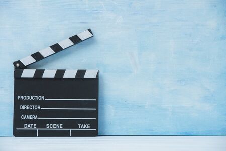 Movie clapper on blue background, cinema conceptの写真素材