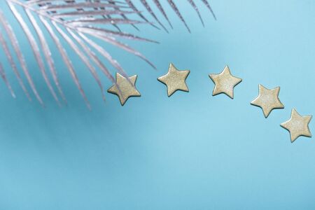 five golden stars on blue background, top rating conceptの写真素材