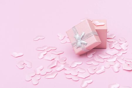 Gift box with hearts on a pink background. Valentine`s day.の写真素材