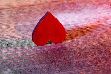 Valentine's Day Background. Red Heart On A Wooden Backgroundの写真素材