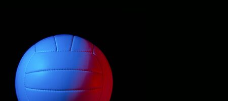 Volleyball ball isolated on black background. Blue neon Banner Art conceptの写真素材
