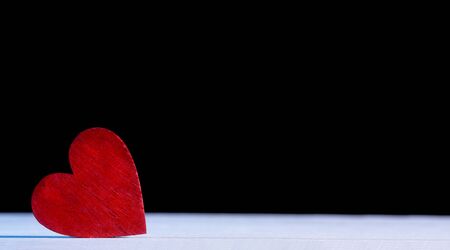Valentine's Day Background. Red Heart On A Wooden Backgroundの写真素材