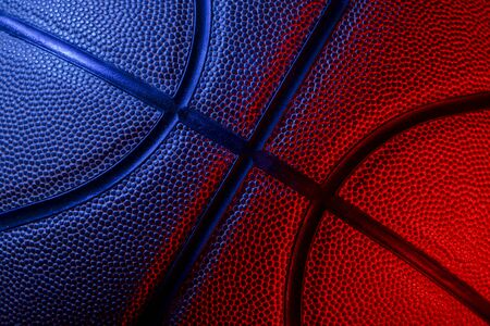 Closeup detail of basketball ball texture background. Blue neon Banner Art conceptの写真素材