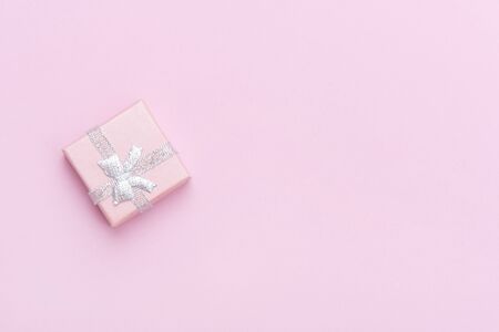 Gift box on a pink background. Valentine`s day.の写真素材