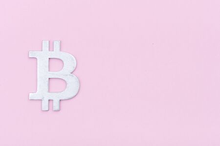 Bitcoin Sign Shape on pink backgroundの写真素材