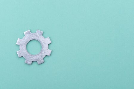 Working system of cogwheels, teamwork, flat lay, bright green backgroundの写真素材