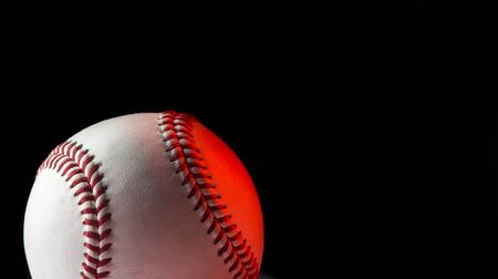 Baseball ball isolated on black background. Blue neon Banner Art conceptの写真素材