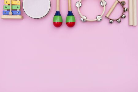 Musical instruments on pink backgroundの写真素材