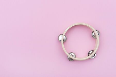 Tambourine isolated on pink background.Single classical music instrument.の写真素材