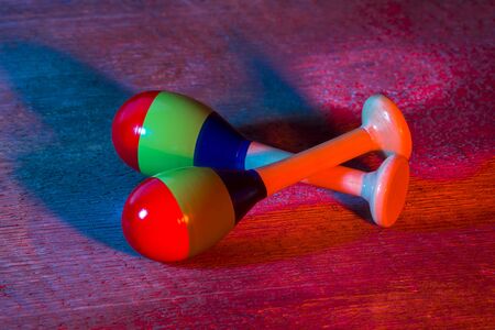 Maracas isolated on wooden background. Music concept.の写真素材