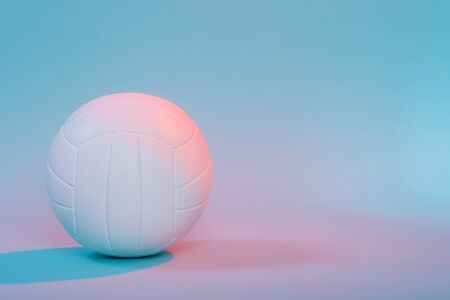 Volleyball ball isolated on neon background. Banner Art concept. Competition, draw.
の写真素材