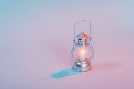 Lamp lantern on studio lighting neon background.の写真素材