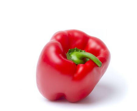 Close-Up Of Red Bell Pepper Against White Backgroundの写真素材