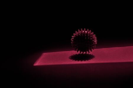 Abstract Virus Strain Model On black Background. Corona virus quarantine. Virus Pandemic Protection Concept. Red filterの写真素材