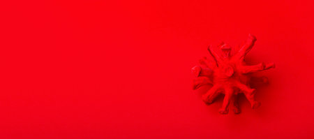Abstract virus strain model of coronavirus 2019-nCoV covid-19 on red background. Virus Pandemic Protection Conceptの写真素材