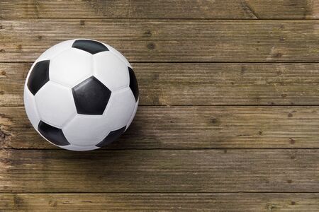 Soccer Ball On Old Wooden Table. Team sportの写真素材