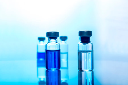 Vials of medicine or vaccine. Vaccination and healtcare concept.