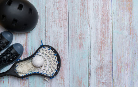 Close-Up Of Lacrosse Equipment On Wooden Background. Lacross Team concept.