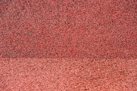 Running track rubber cover texture for background. Sport background concept