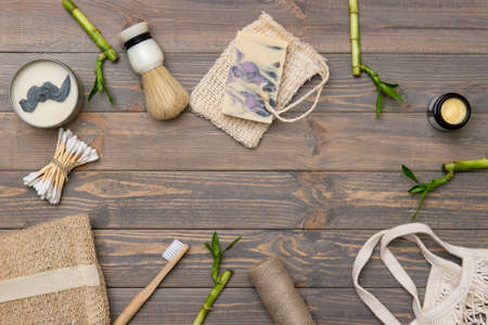 Flat lay shaving tools and bathroom accessories for man on wooden background. Zero waste concept.の写真素材