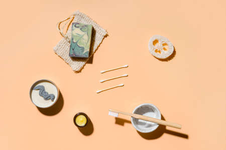Top view of different hygiene and care items on cream color background, zero waste conceptの写真素材