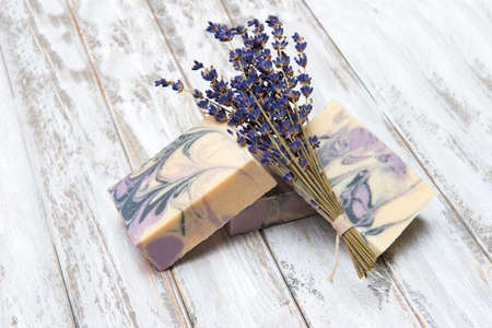 Handmade colorful soaps on wooden table background. Zero waste concept.の写真素材