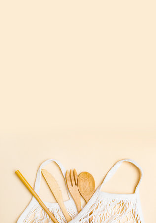 Mesh market bag with bamboo cutlery. Sustainable lifestyle. Plastic free concept. Zero waste eco friendly cleaning kitchen themeの写真素材