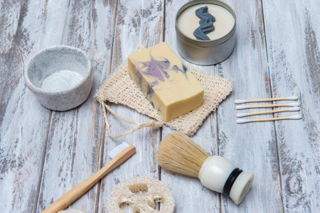 Zero waste bathroom accessories on wooden background. Natural eco bamboo product. Plastic free beauty essentials.の写真素材