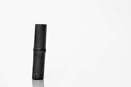 Bamboo charcoal water filter stick. Natural bamboo charcoal is a powerful purifier which refreshes tap water. Electromagnetic shielding, air filtration, and decor conceptの写真素材