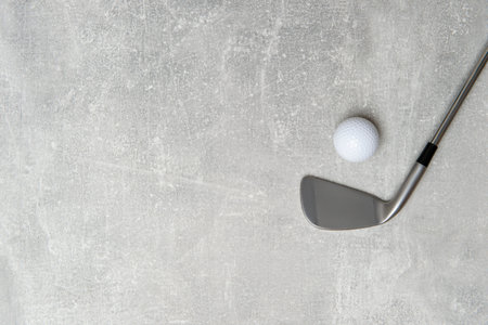 White golf ball and stick on grey background. Horizontal sport poster, greeting cards, headers, websiteの写真素材