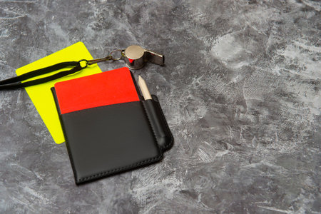 Football soccer referee equipment on grey background. Top view, space for your text. Sport conceptの写真素材