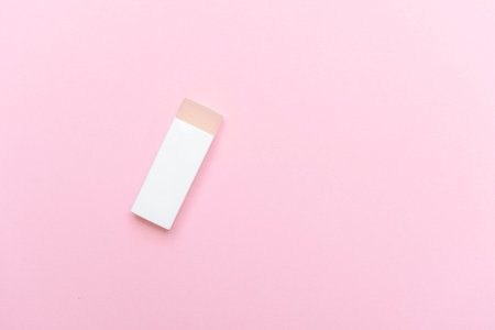 Eraser for cleaning sneakers on pink color background