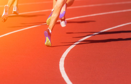 Athletics people running on the track field. Sports and healthy lifestyle concept.