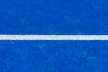 Blue paddle tennis court. Blue court with white lines. Horizontal sport poster, greeting cards, headers, websiteの写真素材