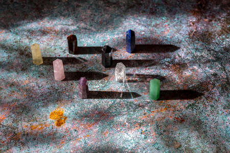 Healing chakra crystals with shadows on magic background. Reiki  and meditation conceptの写真素材
