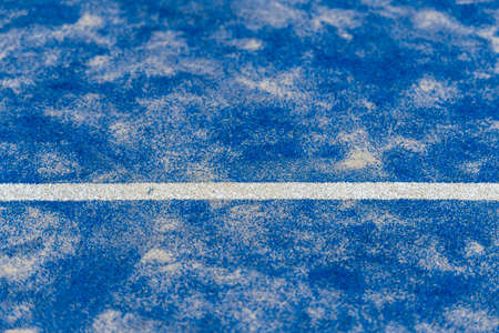 Blue paddle tennis court. Blue court with white lines. Horizontal sport poster, greeting cards, headers, websiteの写真素材