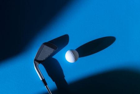 White golf ball and stick with natural lighting on blue background. Horizontal sport poster,...