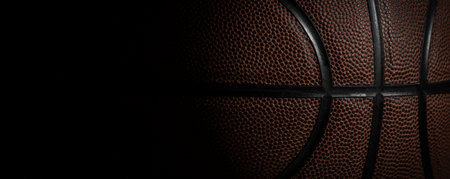 Closeup detail of basketball ball texture background. Horizontal sport theme poster, greeting cards, headers, website and appの写真素材