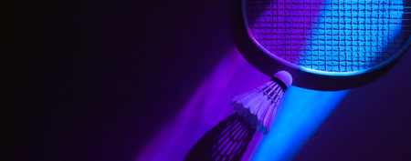 Badminton racket and shuttlecock in vibrant bold gradient holographic neon colors. Horizontal sport theme poster, greeting cards, headers, website and appの写真素材