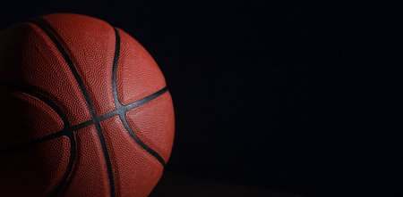 Closeup detail of basketball ball texture background. Horizontal sport theme poster, greeting cards, headers, website and appの写真素材