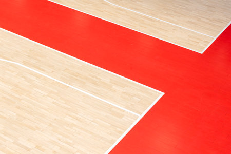 Wooden floor volleyball, basketball, badminton, futsal, handball court. Wooden floor of sports hall with marking lines line on wooden floor indoor, gym courtの写真素材