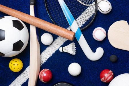 Sports equipment, rackets, bat and balls on blue sport background. Horizontal education and sport poster, greeting cards, headers, websiteの写真素材