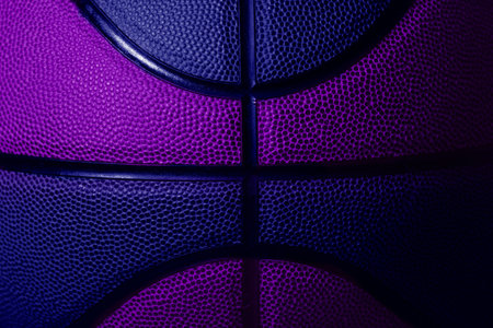 Closeup detail of blue and violet basketball ball texture background. Horizontal sport theme poster, greeting cards, headers, website and appの写真素材